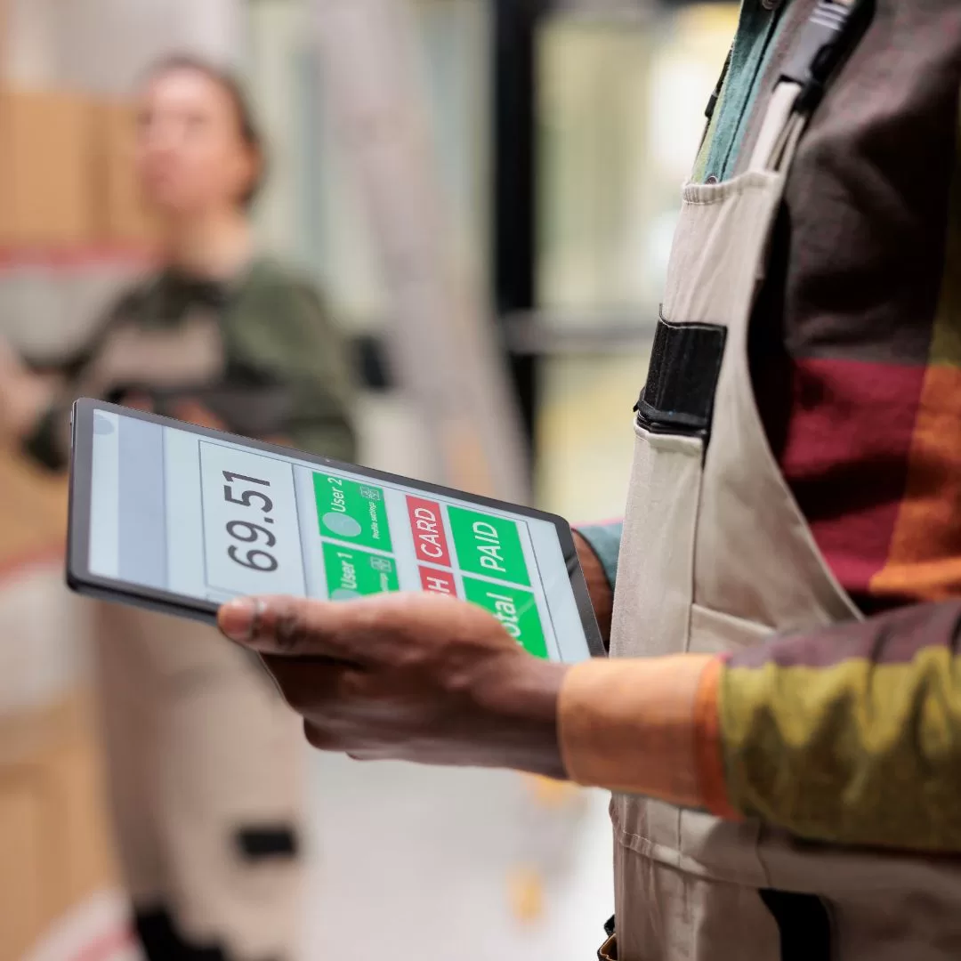 packing worker with tablet